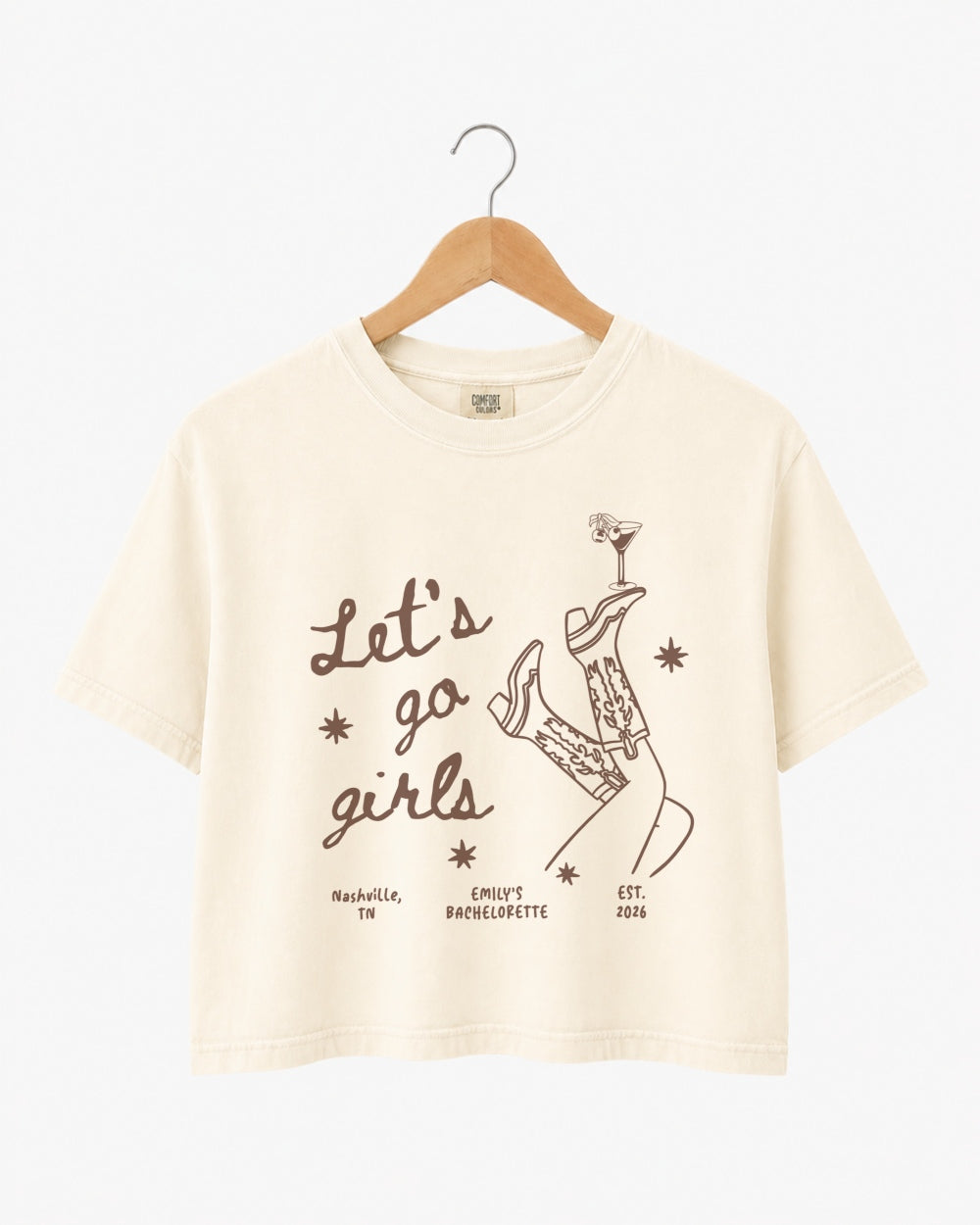 Girls night out crop top with vintage line-art illustration of boots and martinis, script lettering for the whole crew. Perfect for bachelorette parties, girls trips, and nights out on the town.