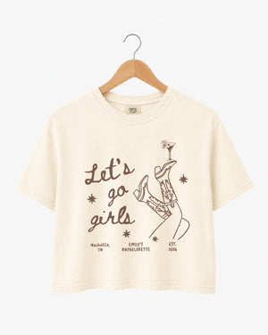 Girls night out crop top with vintage line-art illustration of boots and martinis, script lettering for the whole crew. Perfect for bachelorette parties, girls trips, and nights out on the town.