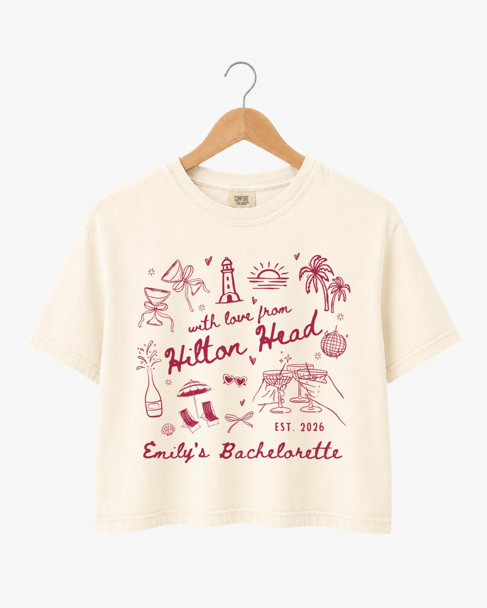 Bachelorette weekend crop top with playful line-art doodles and hand-drawn script, made for the bride and her crew. Personalize with bride name, destination, and EST year for the whole party.