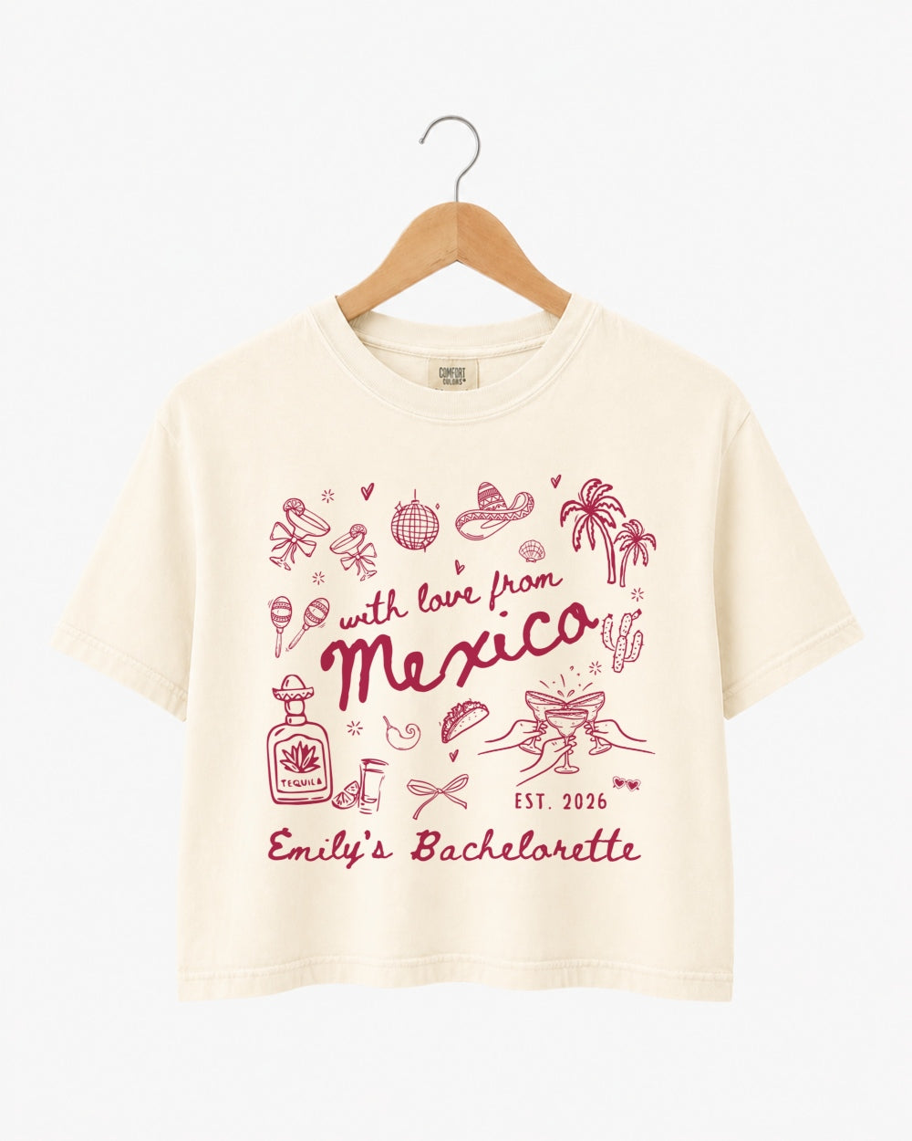 Bachelorette weekend crop top with a Mexico destination theme, playful hand-drawn line art, and script lettering. Personalized with bride name, date, and destination for the full crew.
