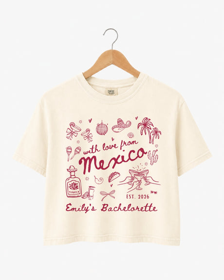 Bachelorette weekend crop top with a Mexico destination theme, playful hand-drawn line art, and script lettering. Personalized with bride name, date, and destination for the full crew.