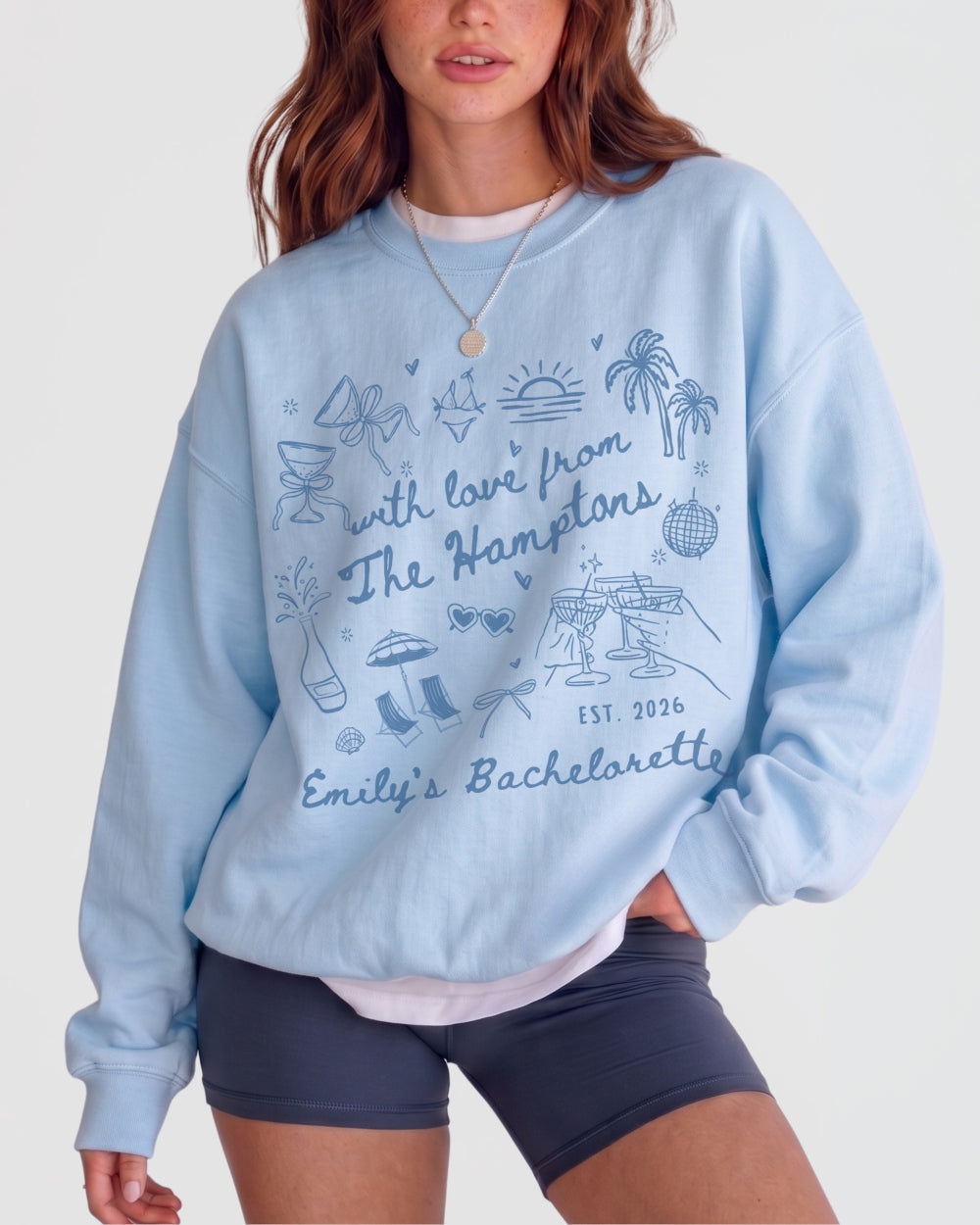 Crew sweatshirt cut for bachelorette weekend with hand-drawn script and playful line-art. Personalized with bride name, destination, and year for the whole Hamptons crew.