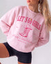 Matching sweatshirts for a Nashville bachelorette rodeo crew with bold pink typography and vintage cowboy boot art. Personalized with bride name, year, and destination city for the full party.