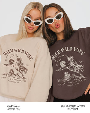 Personalized Wild Wild Wife bachelorette sweatshirt with bride name, date, and city in a vintage western style. Custom matching crew sweatshirts for the whole bachelorette party.