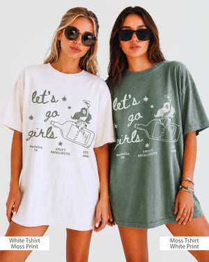 Gift idea for girls night out: Let's Go Girls cowgirl bottle tee with minimalist vintage line-art. Perfect for the friend who lives for a good time and a great shirt.
