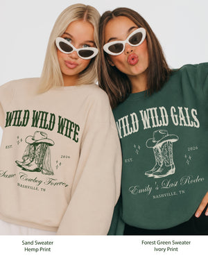 Gift idea for a country western bachelorette party: Wild Wild Wife sweatshirt with vintage varsity lettering and cowboy boots graphic. Perfect for the bride-to-be or her Nashville crew.