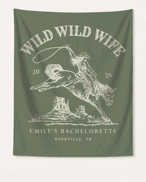 Bachelorette weekend party banner with vintage western Wild Wild Wife theme. Personalized with bride name, date, and destination city for Nashville or any rodeo-themed bach celebration.