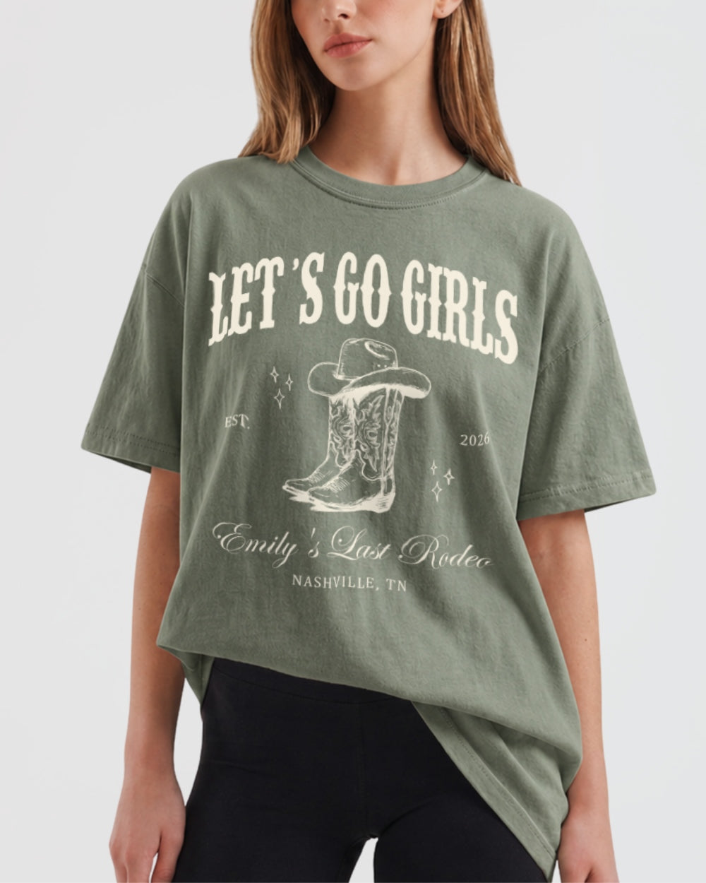 Boxy bachelorette T-shirt with vintage western illustration and script lettering for the bride's last rodeo crew. Personalized with bride name, year, and destination city for every member of the party.