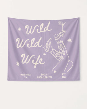 Personalized bachelorette party banner with bride name, date, and city for the Wild Wild Wife theme. Playful cowgirl and martini line-art makes it a standout party decor piece for the whole crew.
