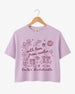 Bride and bridesmaids in matching bachelorette crop tops with minimalist doodle script art. Personalized with the bride's name, year, and city for the full Austin-inspired crew.