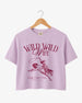 Bride and bridesmaids matching crop tops for a Wild Wild Wife western bachelorette weekend. Vintage rodeo art with personalized name, date, and city for the full crew.
