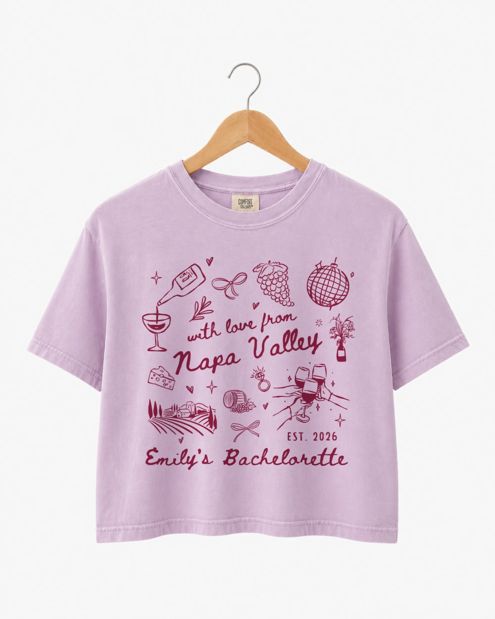 Bride and bridesmaid crop tops for a Napa Valley bachelorette weekend. Whimsical line-art doodle design with script. Personalized with bride name, year, and destination for the full crew.