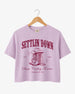 Bride and bridesmaids in matching rodeo bachelorette crop tops for a Last Rodeo western weekend. Personalized with bride name, year, and city for the full crew.