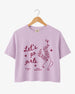 Bride and her girls wearing matching crop tops for a girls night out, featuring vintage line-art illustration and script typography. Perfect for bachelorette parties, girls trips, and hen nights.