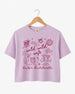Maid-of-honor gift idea: Wild Wild Wife bachelorette crop top with playful doodle art and script lettering. Personalized with bride name, weekend date, and destination city for the whole crew.
