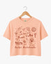 Whimsical line-art doodle bachelorette crop top with script typography and Napa Valley wine weekend theme. Personalized with bride name, year, and destination for the full bridal crew.