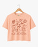Playful doodle-art bachelorette crop top with Wild Wild Wife script lettering for the bride and her crew. Personalized with bride name, date, and destination city for a matching bachelorette weekend set.
