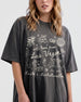 Las Vegas bachelorette weekend tee with playful line-art doodles and script lettering. Personalized with bride name, year, and destination for the whole crew.