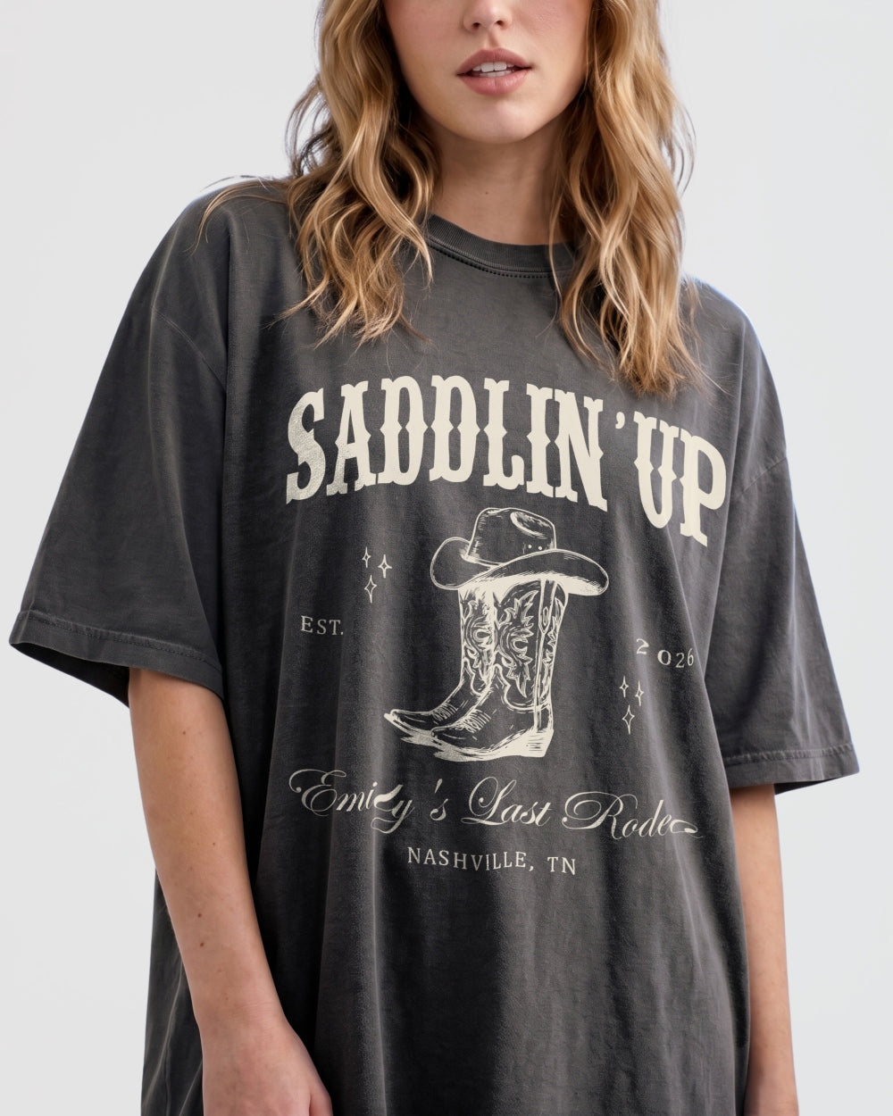 Bachelorette weekend western tee for the Last Rodeo crew, vintage cowboy boot illustration with bride name, year, and city customizable for Nashville or any destination.