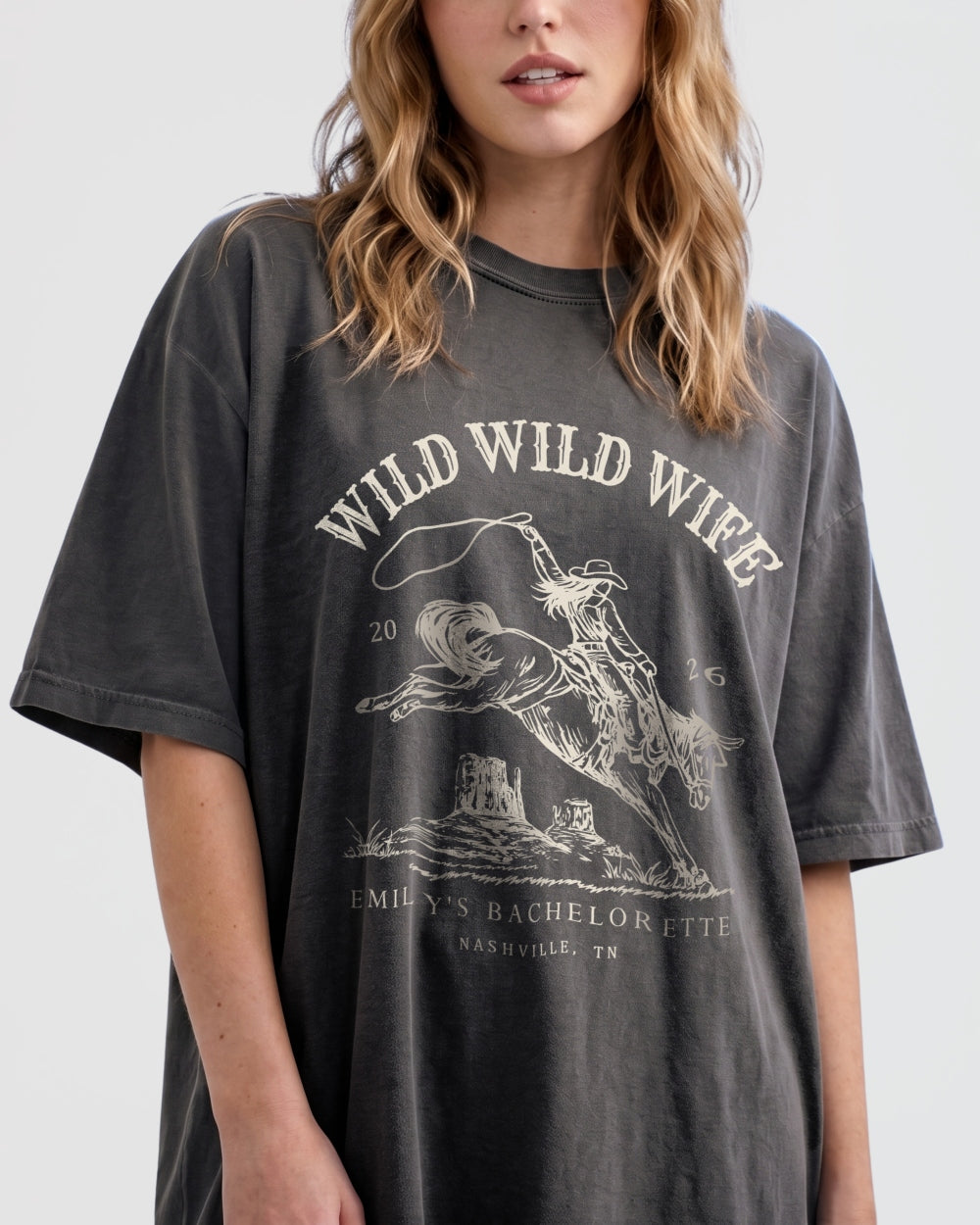 Bachelorette weekend rodeo tee with vintage western illustration for the Wild Wild Wife crew. Personalized with bride name, destination city, and weekend date for the whole party.