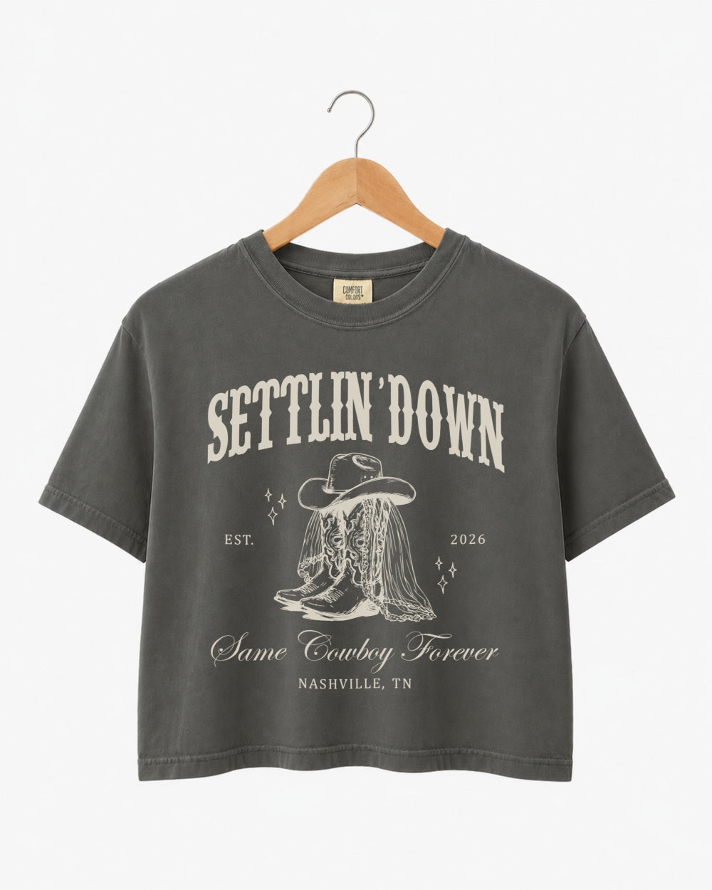Cropped bachelorette rodeo tee with vintage western illustration and script lettering. Personalized with bride name, date, and city for the last rodeo crew.