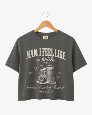 Cropped bachelorette tee with vintage western script and cowboy boot illustration for a Nashville rodeo weekend. Personalized with bride name, year, and city for the full Last Rodeo crew.