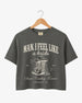 Cropped bachelorette tee with vintage western script and cowboy boot illustration for a Nashville rodeo weekend. Personalized with bride name, year, and city for the full Last Rodeo crew.