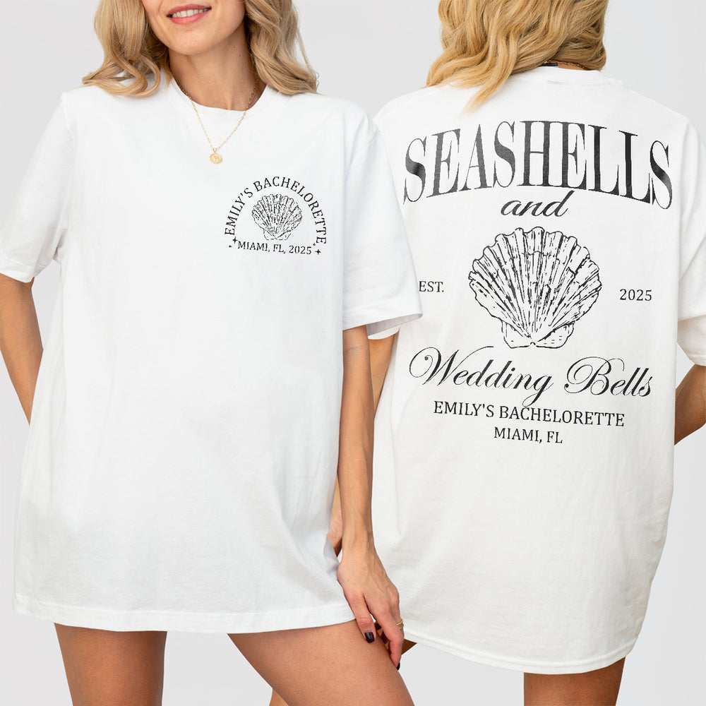 Soft white cotton shirt perfect for a beach bachelorette party or coastal bridal shower featuring seashells and wedding bell designs