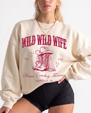 Vintage western varsity sweatshirt for a country bachelorette party, bold boot graphic and retro lettering. Personalized with bride name, year, and destination city for the whole crew.