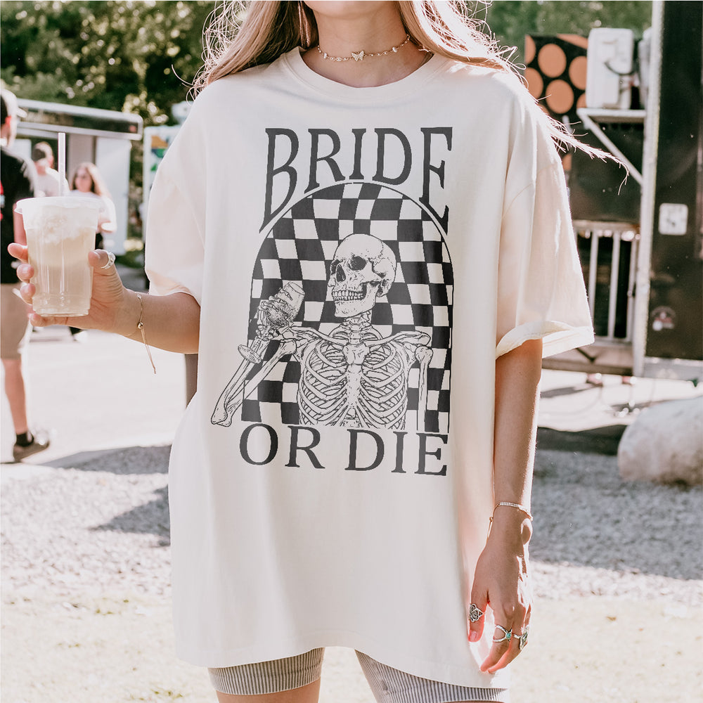Funny bachelorette shirt for the bride-to-be matching her bridal party, featuring a Halloween witch theme perfect for a spooky celebration