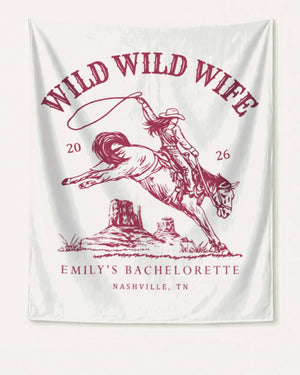Maid-of-honor gift idea: Wild Wild Wife bachelorette banner with vintage western art. Personalized with bride name, year, and destination city for the whole bridal crew.
