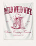 Gift idea for a cowgirl bachelorette party: Wild Wild Wife banner with vintage western illustration and script lettering. Customizable with bride name, year, and destination city.