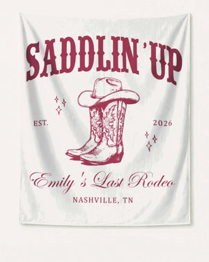 Gift idea for the bachelorette rodeo crew: a Last Rodeo banner with vintage western art for the Nashville party space. Personalized with bride name, year, and city.