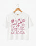 Boxy cropped bachelorette tee with playful doodle art and Wild Wild Wife script lettering for the bride and her crew. Personalize with bride name, date, and destination city.