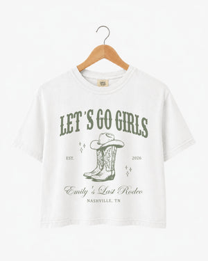 Bachelorette rodeo weekend crop top with vintage western script and cowboy boot art for the Nashville-bound bride crew. Bride name, year, city, and party title customizable for the full squad.