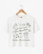 Bachelorette weekend crop top with Hamptons theme, playful illustrated doodles, and script text. Personalized with bride name, year, and destination for the whole crew.