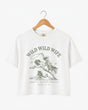 Bachelorette weekend crop top with vintage western rodeo theme for the Wild Wild Wife bride and her crew. Personalized with bride name, date, and destination city.