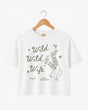 Cowgirl bride crop top with custom Wild Wild Wife graphic for country wedding celebrations
