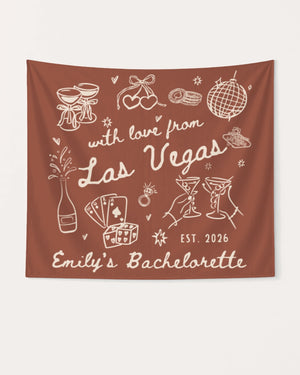 Hanging banner for a Las Vegas bachelorette weekend with hand-drawn doodle art. Personalized with bride name, date, and destination city for the party setup.