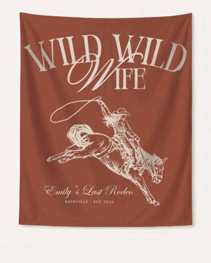 Bride and bridal crew bachelorette banner with vintage cowgirl illustration and Wild Wild Wife script. Personalized with bride name, destination city, and year for the last rodeo weekend.