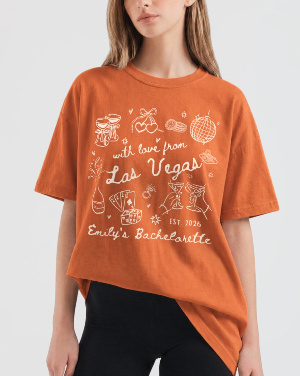 Gift idea for the bride-to-be: Las Vegas bachelorette t-shirt with playful doodle art and script. Personalized with bride name, year, and destination city for the whole crew.
