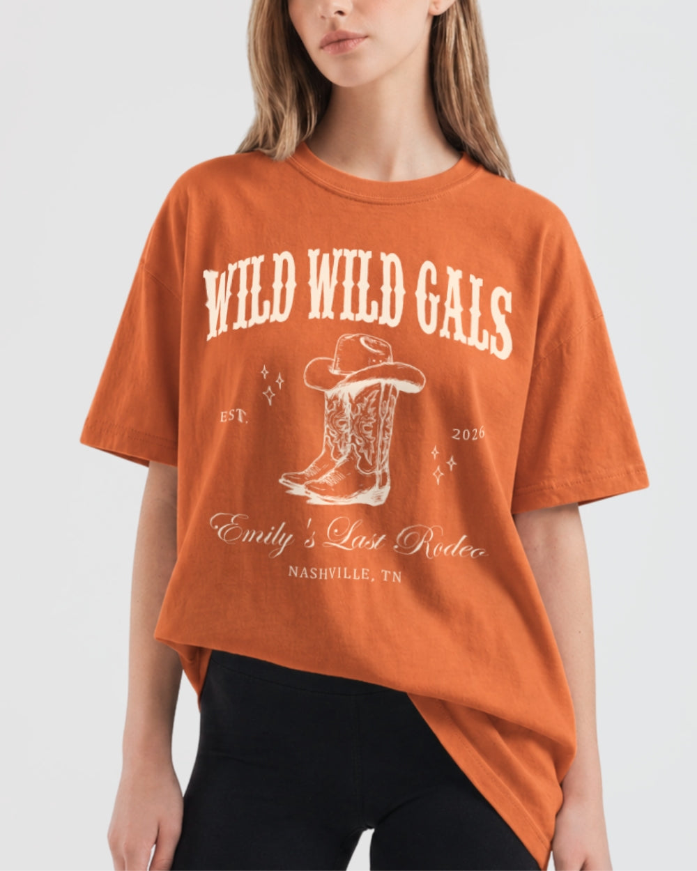 Gift idea for a country bride: Wild Wild Wife western-themed bachelorette tee with ornate cowboy boot illustration and vintage serif script. Perfect for the bride who loves Nashville style.