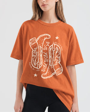Western bachelorette shirt with Wild Wild Wife design for bridal crew photos
