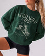 Boxy crewneck sweatshirt with vintage western illustration for a country bride bachelorette. Customizable with destination, date, and bride name for the whole Wild Wild Wife crew.