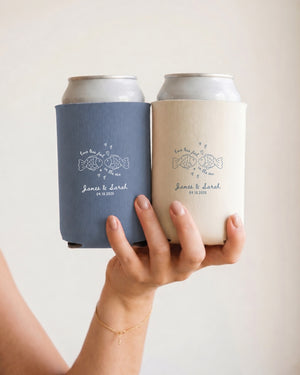 Wedding reception can coolers with palm tree and floral line art, personalized with couple names and wedding date. Perfect favor for a beach or tropical outdoor ceremony.
